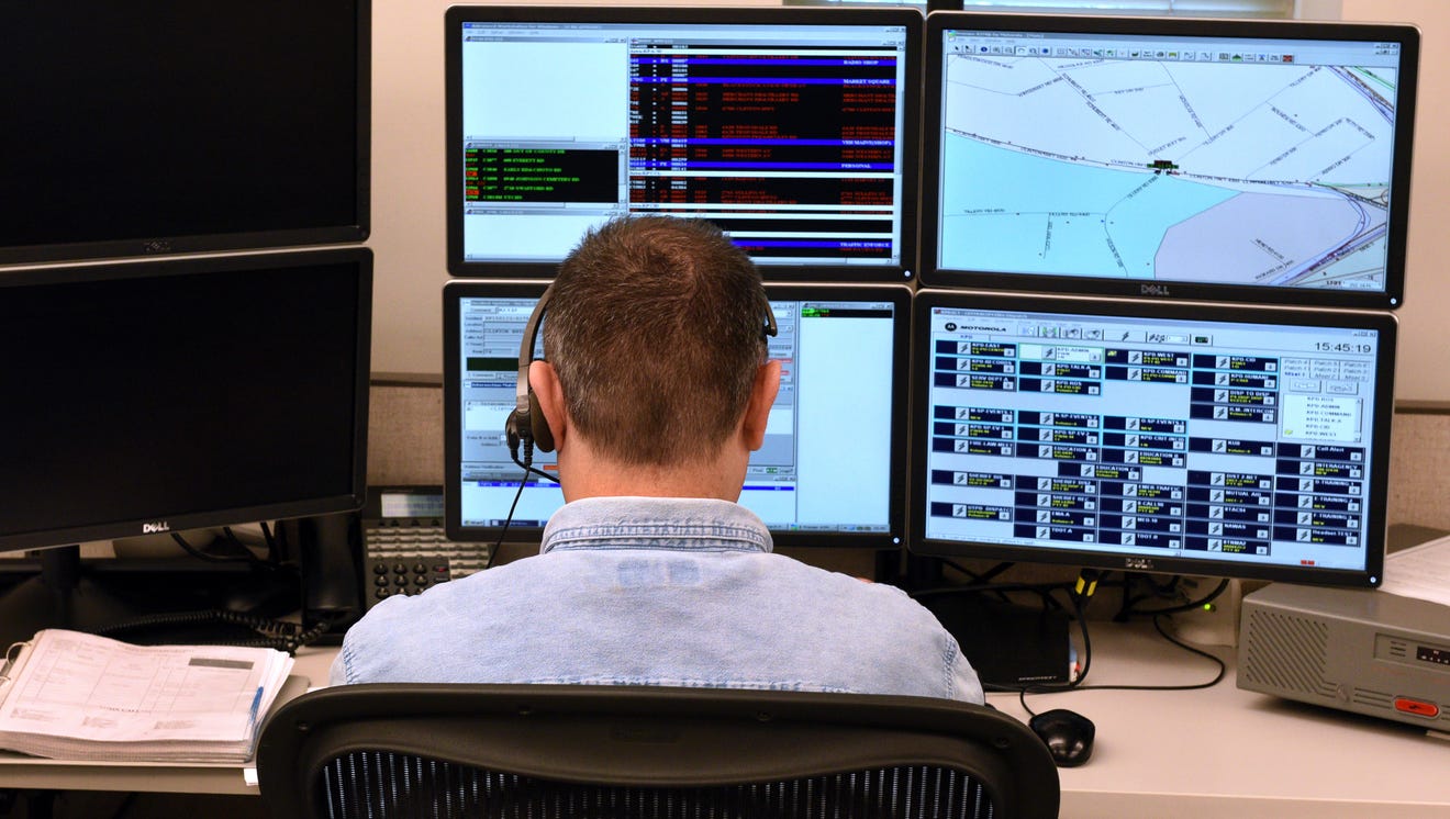 Jerald Jenkins dispatches KPD officers from the Knox County Emergency Communications Center on Jan. 23, 2015.