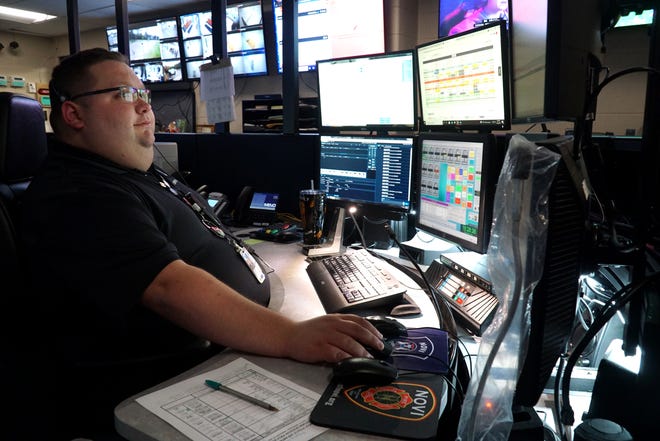 Dispatcher Charlie Jordan at the Novi Police Communications center on Sept. 22, 2021. Jordan was about nine and half hours into a twelve hour shift at the time of this photo.