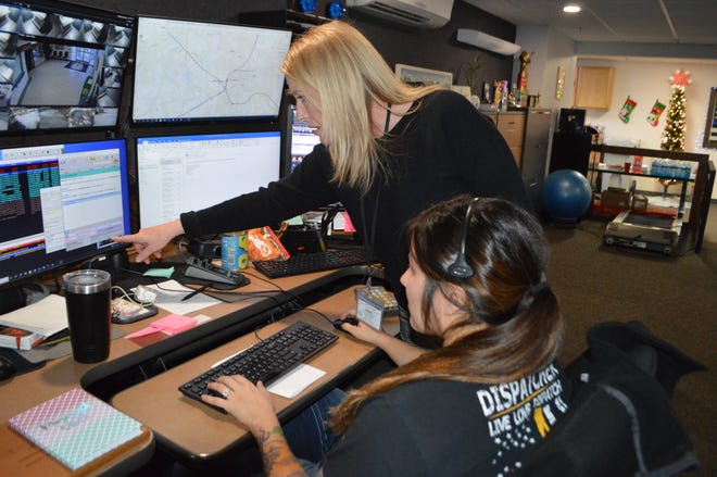 Northern Ellis Emergency Dispatch (NEED), which operates out of the Midlothian Police Department facility, last week launched a new Emergency Medical Dispatch system for the citizens of Midlothian. Pictured in the photo is NEED manager Christine Thompson (standing), working with emergency dispatcher Raquel Deranjic to field a call on launch day.