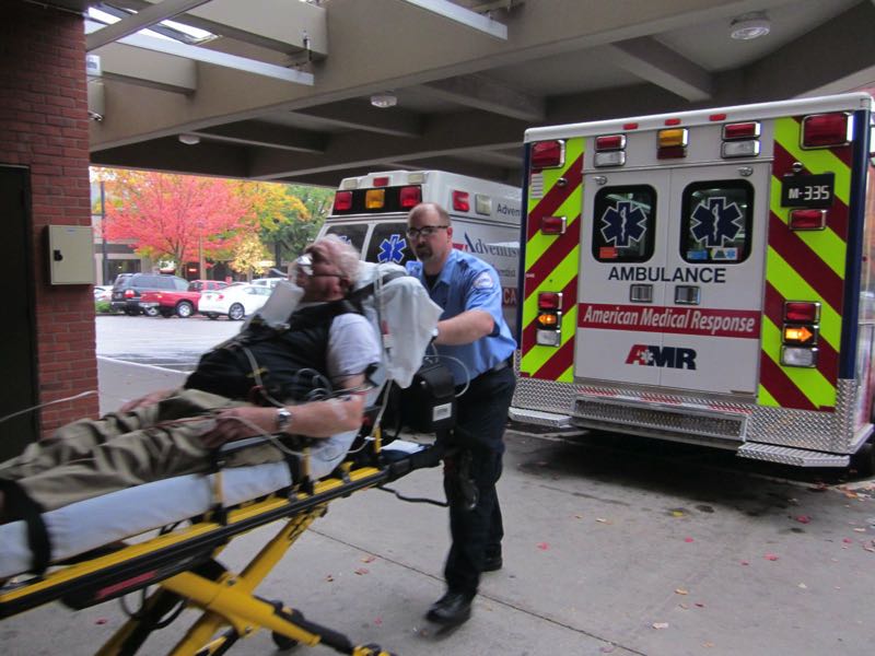 PHOTO COURTESY: AMR - American Medical Response paramedics bring a patient to Good Samaritan Medical Center's emergency room in Portland.